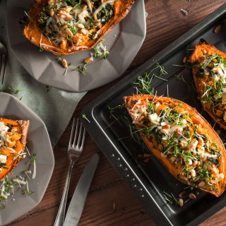 Recipe for stuffed sweet potato with spinach, feta cheese, parmesan and pine seeds. Comforting, simple and delicious!