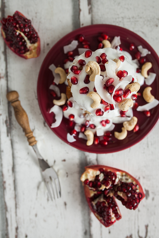 Recipe for Cashew Butter Coconut Milk Pancakes with a Curd Coconut Topping garnished with Cashew Seeds and Pomegranate. Foodstyling and Recipe from Purple Avocado / Sabrina Dietz