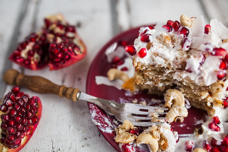 Recipe for Cashew Butter Coconut Milk Pancakes with a Curd Coconut Topping garnished with Cashew Seeds and Pomegranate. Foodstyling and Recipe from Purple Avocado / Sabrina Dietz