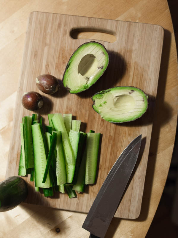 Avocado and Cucumber on a Wooden Board for Sushi