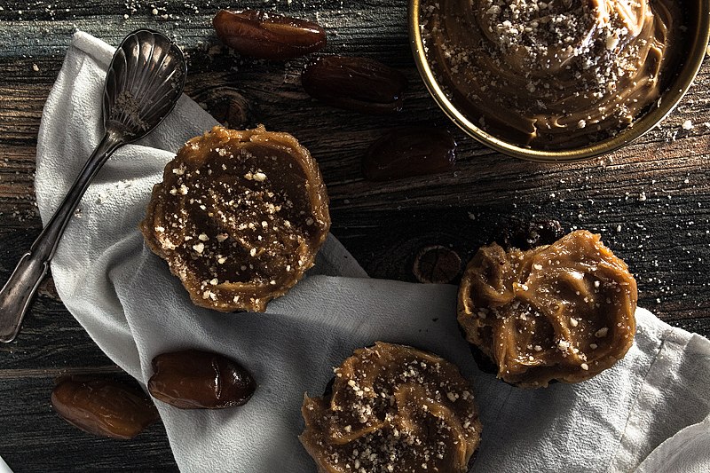 Vegan no bake Date Brownies Recipe. A little bit healthy and a whole lot of taste. With a peanut butter maple syrup topping.