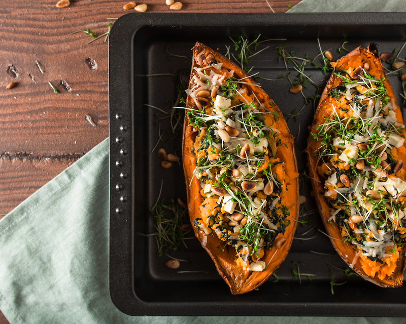 Recipe for stuffed sweet potato with spinach, feta cheese, parmesan and pine seeds. Comforting, simple and delicious! Recipe and Food Photography from Purple Avocado / Sabrina Dietz