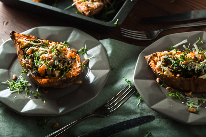 Recipe for stuffed sweet potato with spinach, feta cheese, parmesan and pine seeds. Comforting, simple and delicious! Recipe and Food Photography from Purple Avocado / Sabrina Dietz