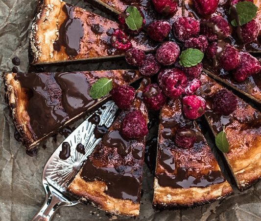 Brownie Cheesecake Recipe - A juicy cheesecake topping with a chocolatey brownie base. Foodstyling by Purple Avocado