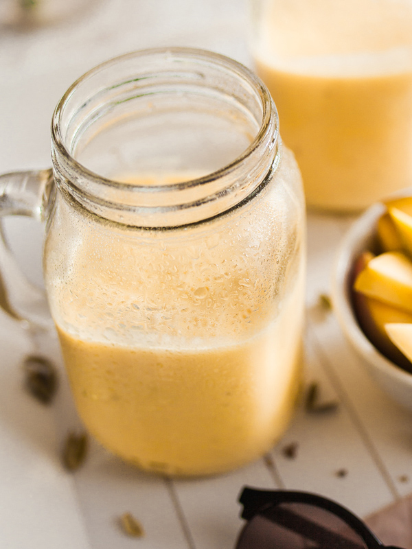 The Mango Lassi - a refreshing yoghurt drink from india - is the perfect summer recipe or side to your hot and spicy food. Even the vegan Mango Lassi is easily made. Foodstyling and Food Photography from Purple Avocado / Sabrina Dietz