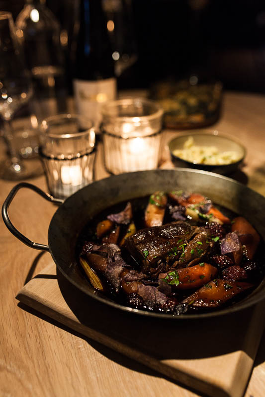 Deer shoulder with redwine sauce, braised vegetables and homemade pasta at the Hygge Restaurant Hamburg