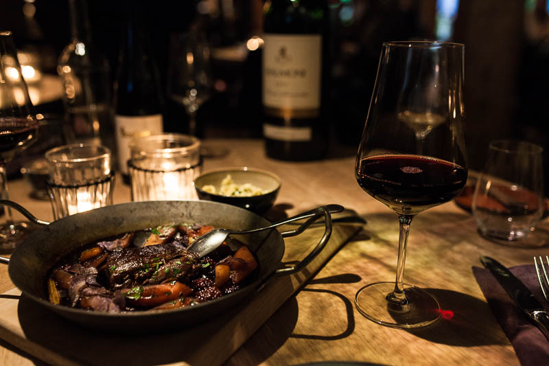 Deer shoulder with redwine sauce, braised vegetables and homemade pasta at the Hygge Restaurant Hamburg