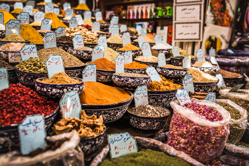 Spice mixtures in big bowls and bags at Vakil Bazar